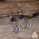 Boucles d'oreilles féeriques aux volutes rondes argentées style elfique et Art Nouveau surmontées de perles en Améthyste