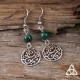 Boucles d'oreilles féeriques aux volutes rondes argentées style elfique et Art Nouveau surmontées de perles en Malachite