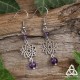 Boucles d'oreilles zen et féeriques ornées d'une Fleur de Vie argentée et de perles d'Améthyste violet foncé.