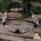 Bijou bracelet médiéval elfique Deannel entrelacs celtiques infinis argenté pierre naturelle Lapis Lazuli bleu foncé.