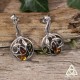 Boucles d'oreilles féeriques et Art Nouveau ornée d'un Trio de gouttes d'Ambre et de volutes en Argent massif.