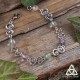 Bracelet médiéval et féerique Faerell orné de Spirales argentées entourées de perles de Fluorite verte et violet pastel.