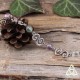 Bracelet médiéval et féerique Faerell orné de Spirales argentées entourées de perles de Fluorite verte et violet pastel.