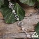 Bracelet féerique art nouveau Kalya volutes elfiques argentées triquetra médiéval celtique et Quartz Rose