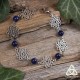 Bracelet poétique et zen orné de délicates Fleur de Vie argentée et ajourées entourées de perles en Lapis Lazuli bleu nuit.