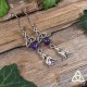Boucles d'oreilles médiévales fantasy ornées d'un petit loup celtique argenté et d'une perle en Améthyste violette.