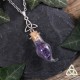 Collier féerique alchimie Fiole de verre en pointe aux éclats d'Améthyste violette et Triquetra celtique argentée.