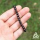 Bracelet réglable élastique composé de jolies perles de Grenat naturel rouge foncé presque noir pour un effet gothique.