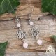 	Boucles d'oreilles zen et féeriques ornées d'une Fleur de Vie argentée et de perles en Quartz rose pastel pour mariage.