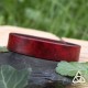 Bracelet artisanal en cuir aux nuances de rouge et de brun intemporel pour homme ou femme, réglable, médiéval fantasy.