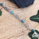 Bijou bracelet médiéval elfique Deannel entrelacs celtiques infinis argenté et perles d'Apatite bleu turquoise.