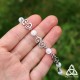 Bracelet médiéval et féerique Faerell orné de Spirales argentées entourées de perles de Cristal de Roche blanc craquelé.