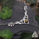 	Collier elfique et Art Nouveau aux volutes et feuilles argentées et pierre gemme Oeil de Tigre brun