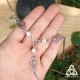 Bracelet de main pour mariage médiéval féerique orné de volutes elfiques et Pierre Lune arc-en-ciel reflet bleu