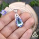 	Pendentif féerique Larme goutte de Cristal bleu vitrail ou violet mauve et volutes elfiques art nouveau en Argent massif 925