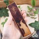 Marque page artisanal en cuir repoussé marron et nature orné de la silhouette de Gandalf le Gris et des initiales J R R Tolkien