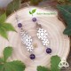 Boucles d'oreilles pendantes en acier inoxydable ornées de flocons de neige argenté entourés de perles en Améthyste violet foncé