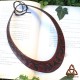 Collier plastron artisanal en cuir marron orné de volutes et feuilles pour mariage médiéval fantasy, féerique ou celtique