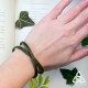 Bracelet artisanal en cuir fin sur deux rangées médiéval fantasy Feuilles elfiques. vert foncé