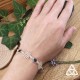 Bracelet Yaell en argent et topaze bleue porté au poignet, mise en situation, style zen et féerique